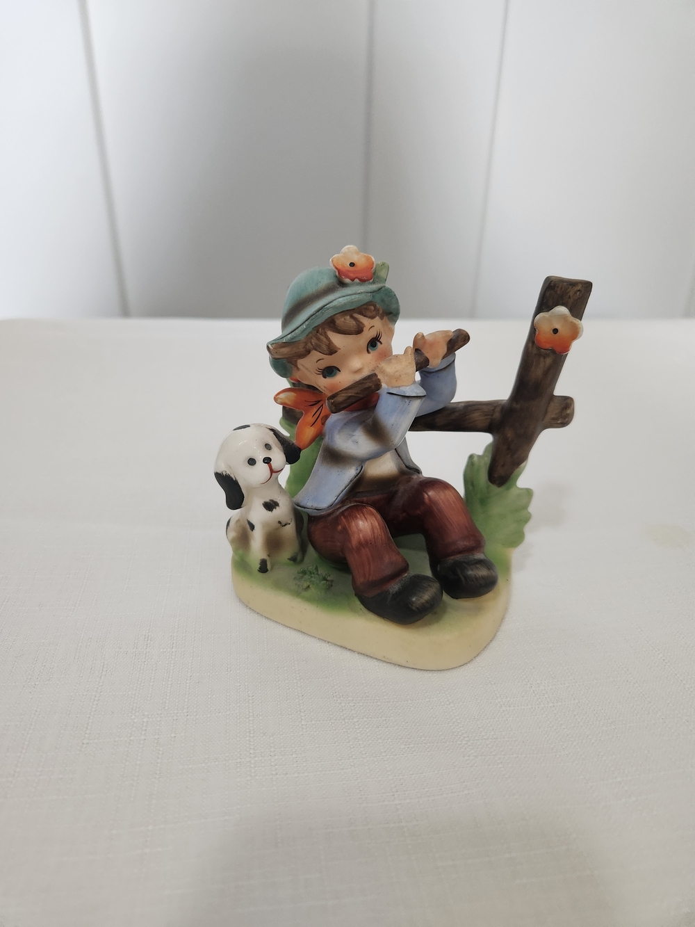 Napcoware Hand-Painted Boy with Dog Figurine